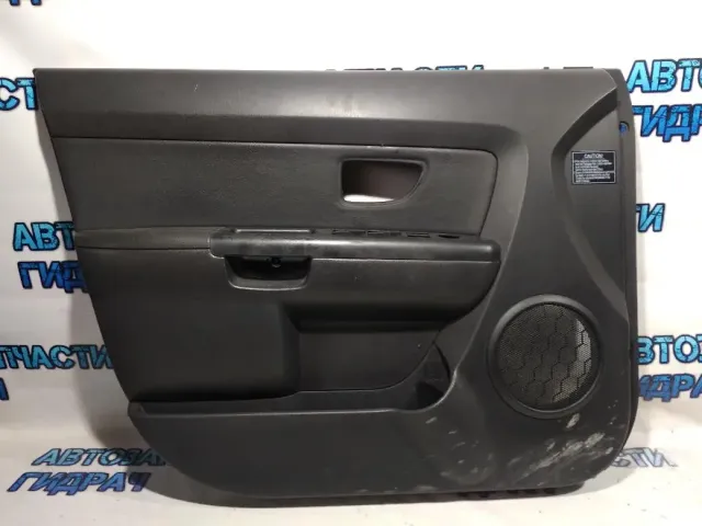 Обшивка двери передней левой KIA Soul 823012K400WK.