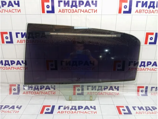 Стекло двери задней левой SsangYong Actyon  7337634011