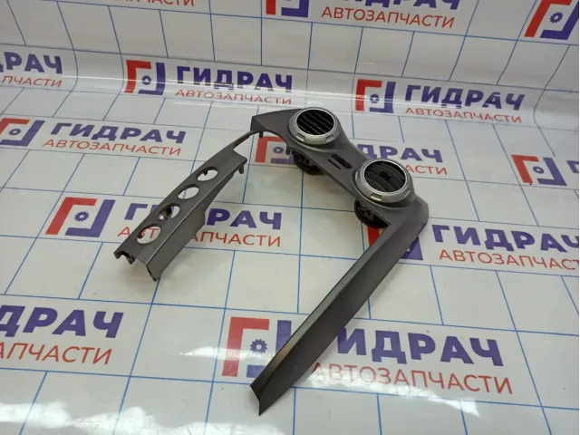 Накладка декоративная на торпедо центральная SsangYong Actyon Sport 7661031000HCH