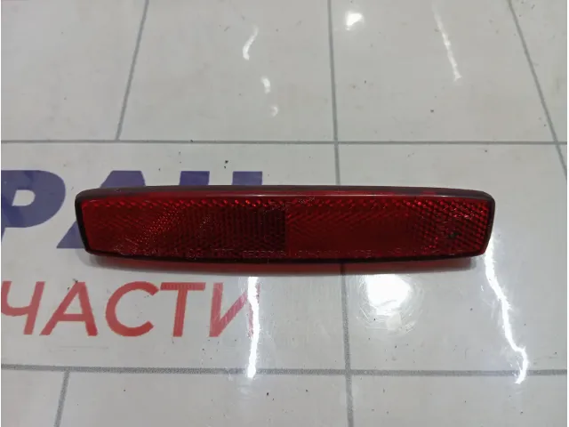 Отражатель в бампер задний левый SsangYong Kyron