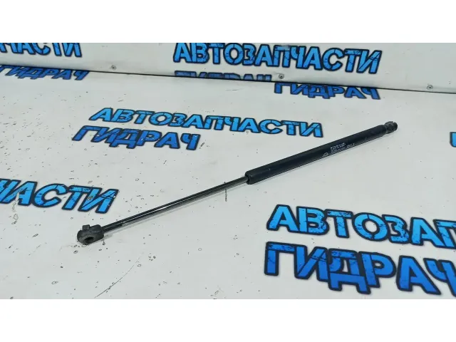 Амортизатор двери багажника правый Ssang Yong Kyron 7146009000.