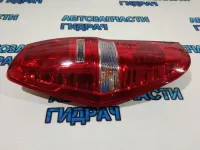 Фонарь задний левый Hyundai H1/Grand Starex 924014H000 . Дефект отверстий крепления