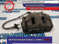 Суппорт тормозной передний левый Hyundai H1/Grand Starex 581104H000 .