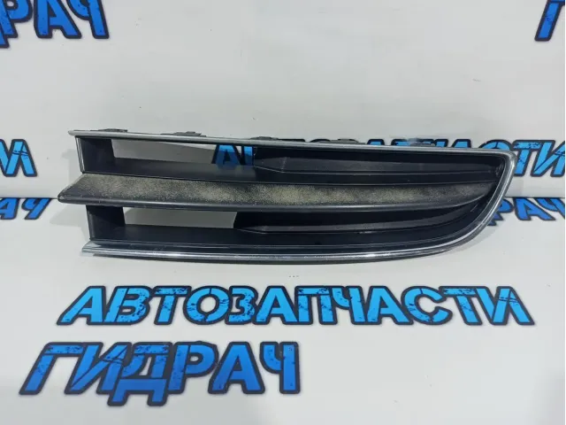 Решетка радиатора левая Subaru Tribeca 91121-XA19A.