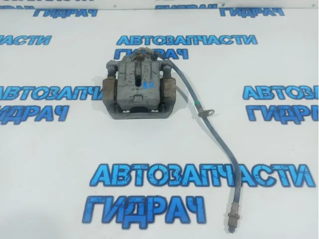 Суппорт задний правый Subaru Tribeca 26692-XA00B.