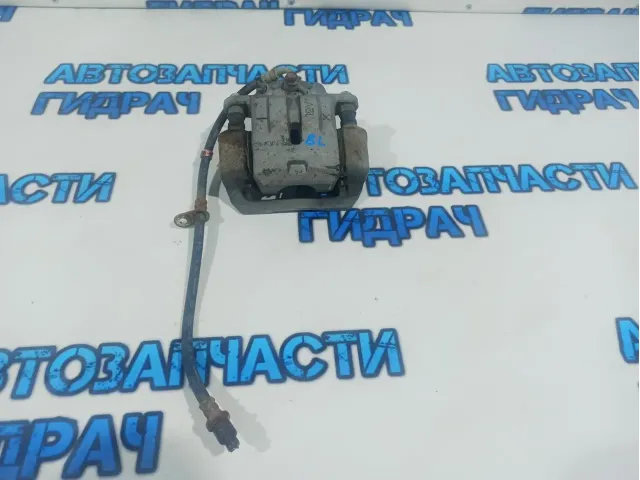 Суппорт задний левый Subaru Tribeca 26692-XA01B.