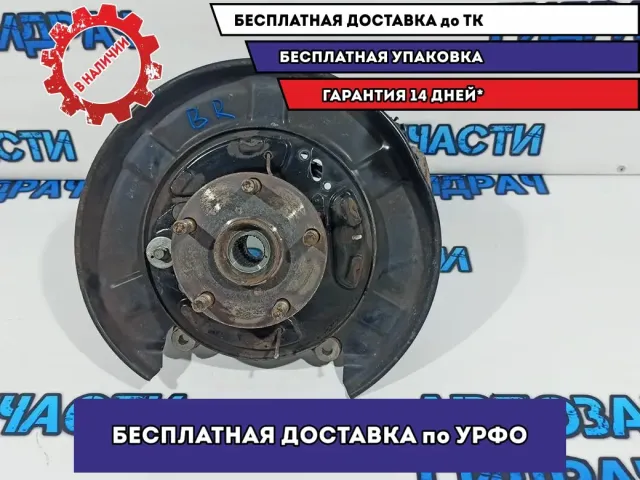 Кулак поворотный задний правый Subaru Tribeca 28411-XA00A. В сборе. С датчиком ABS.