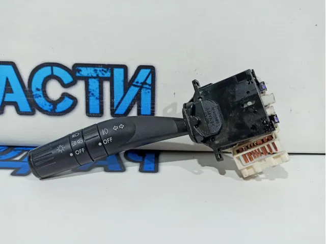 Переключатель поворотов подрулевой Subaru Tribeca 83115-AG051.