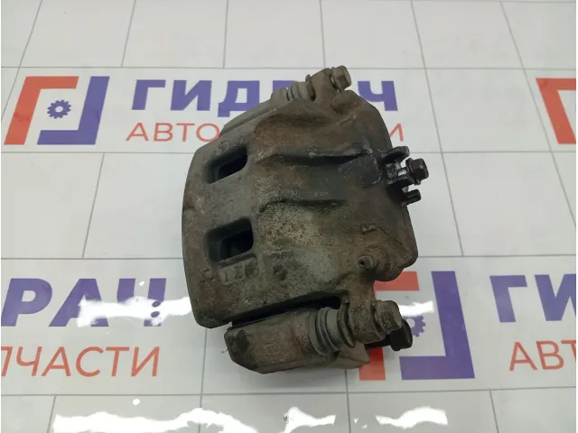 Суппорт тормозной передний правый Subaru Forester 26292SC020