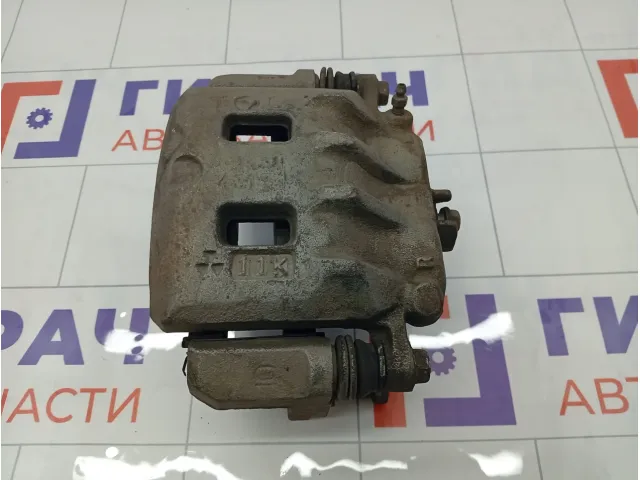 Суппорт тормозной передний левый Subaru Forester 26292SC030