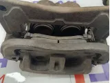 Суппорт тормозной передний левый Subaru Forester 26292SC030