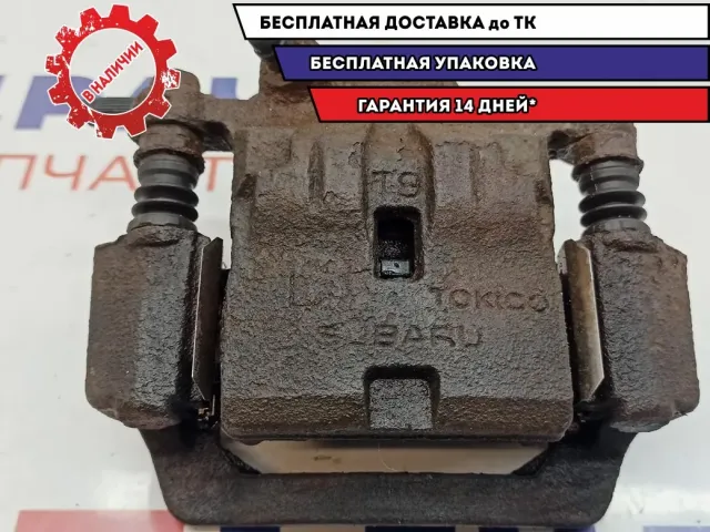Суппорт тормозной задний левый Subaru Impreza (G12) G12 26692-FG010.