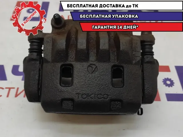 Суппорт тормозной передний левый Subaru Impreza (G12) G12 26292-FE011.