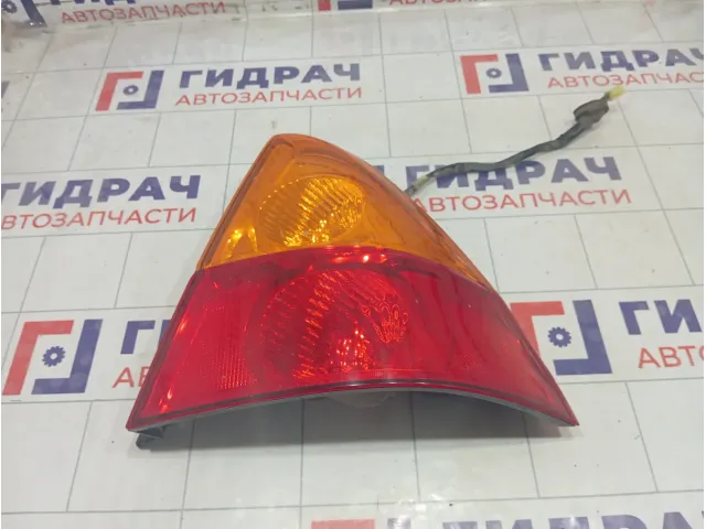 Фонарь задний наружный правый Suzuki Liana 3565055G00