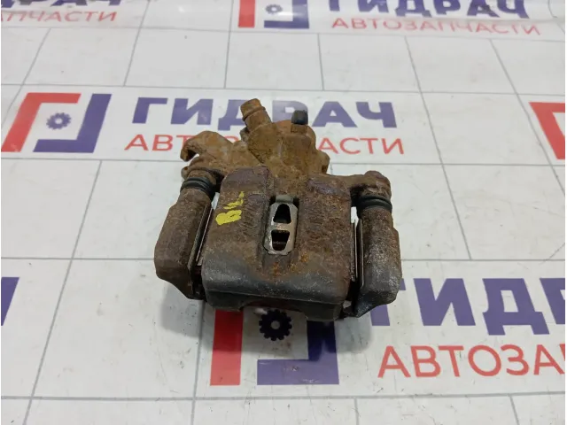 Суппорт тормозной задний левый Suzuki SX4 5540280J01999