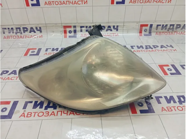 Фара левая Suzuki Swift 3532063J00