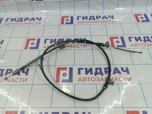 Трос стояночного тормоза левый Suzuki Grand Vitara (JT) 54402-77K00