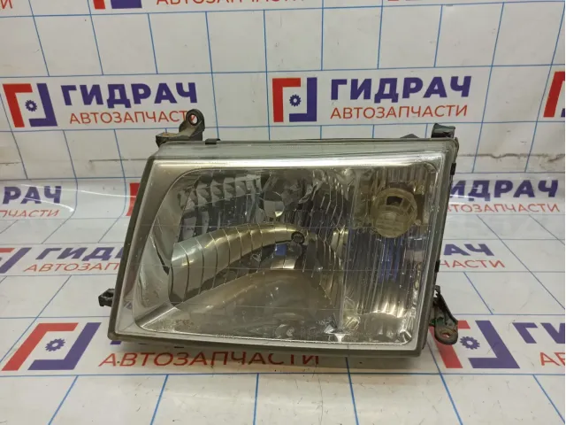 Фара левая Toyota Land Cruiser (J100) 81059-60040