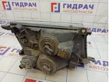 Фара левая Toyota Land Cruiser (J100) 81059-60040
