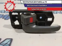 Ручка двери внутренняя левая Toyota Land Cruiser 100 6920630150.