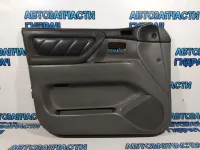 Обшивка двери передней левой Toyota Land Cruiser 100 6766060030.