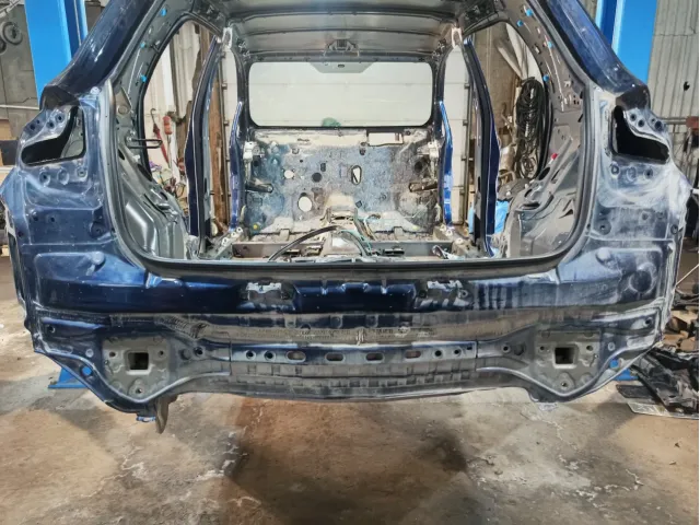 Панель задняя Toyota Auris (E150) 58307-02090.