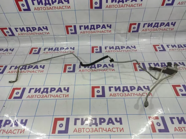 Трубка кондиционера Toyota Avensis (T250) 88716-05382.