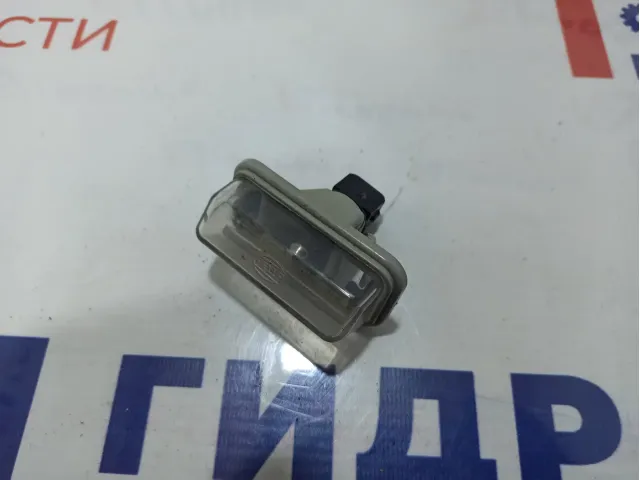Фонарь подсветки номера Toyota Avensis (T250) 8127005041.