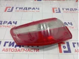 Фонарь задний наружный левый Toyota Camry 8156133470