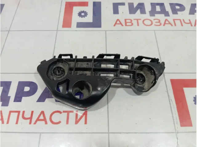 Кронштейн бампера переднего левый Toyota Camry 5253633060