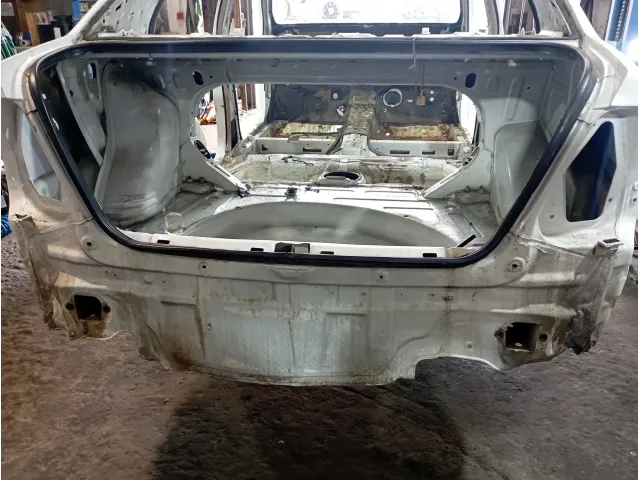 Панель задняя Toyota Corolla (E120)