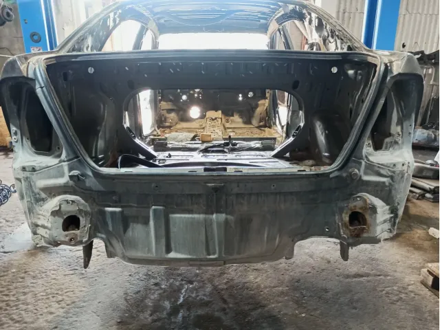 Панель задняя Toyota Corolla (E120)