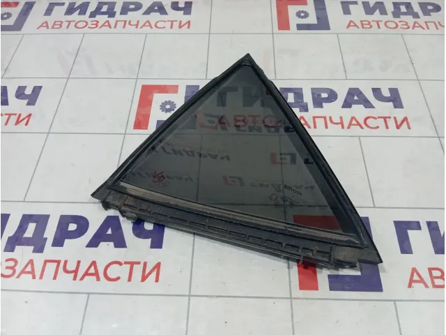 Стекло двери задней левой Toyota Corolla 6812402330
