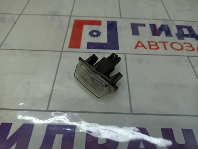 Фонарь подсветки номера Toyota Corolla 812700D120