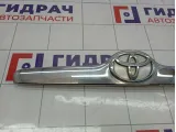 Накладка крышки багажника Toyota Corolla (E120) 76811-12620