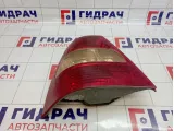 Фонарь задний левый Toyota Corolla (E120) 81561-1E160