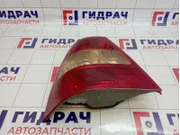 Фонарь задний левый Toyota Corolla (E120) 81561-1E160