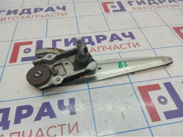 Стеклоподъемник механический задний левый Toyota Corolla (E150) 69840-12440