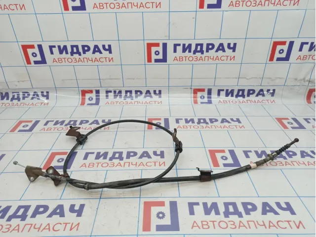 Трос стояночного тормоза левый Toyota Corolla (E150) 46430-12580