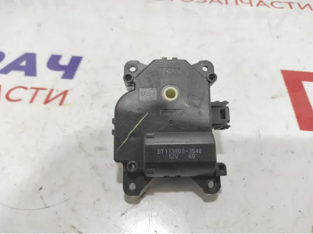 Моторчик заслонки отопителя Toyota Corolla (E180) 87106-02260.