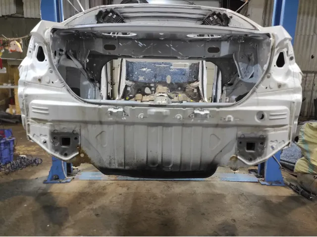 Панель задняя Toyota Corolla (E180) 58307-02370.