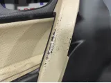 Обшивка двери передней левой Toyota Corolla (E180) 6762002R40. Перетянута в светлый.