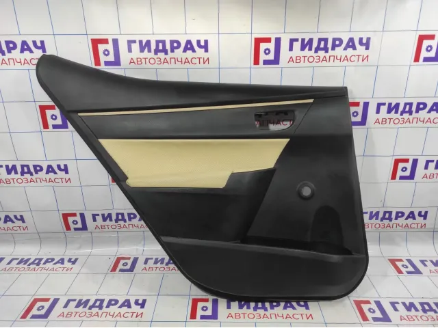Обшивка двери задней левой Toyota Corolla (E180) 6764002R20. Перетянута в светлый.