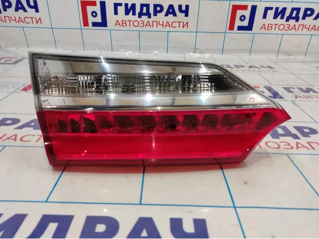 Фонарь задний внутренний левый Toyota Corolla E18 8159002A20.