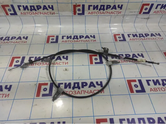 Трос стояночного тормоза правый Toyota Corolla E18 4642002300.