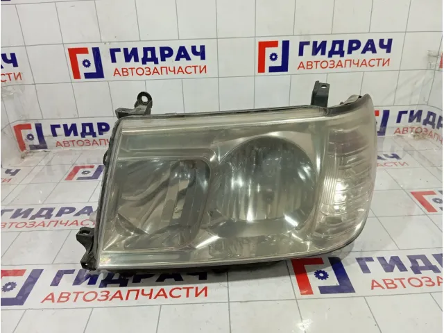 Фара левая Toyota Land Cruiser (J100) 81050-60040