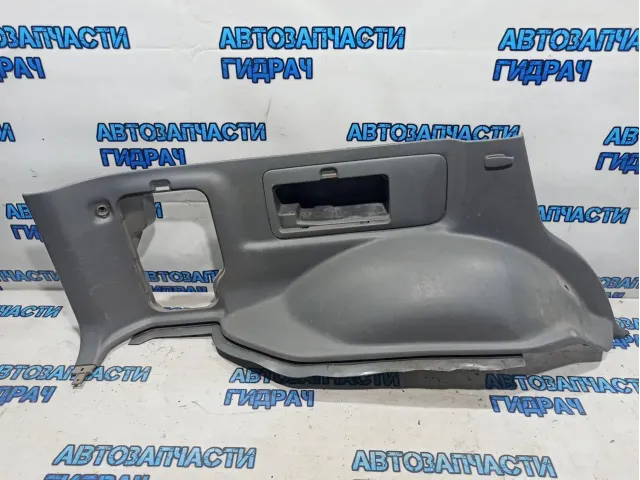 Обшивка багажника левая нижняя Toyota Land Cruiser 100 62512-60320.