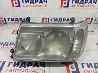 Фара левая Toyota Land Cruiser 8105060040