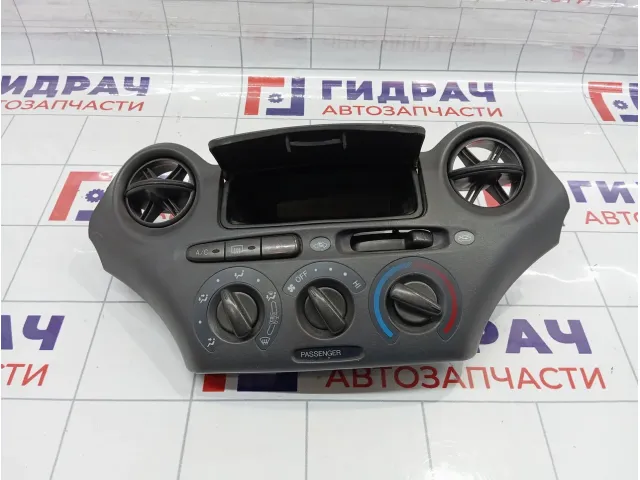 Блок управления отопителем (печкой) Toyota Vitz (XP10) 5593652040