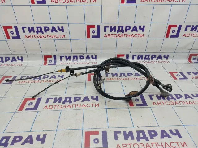 Трос стояночного тормоза Toyota Yaris (XP90)